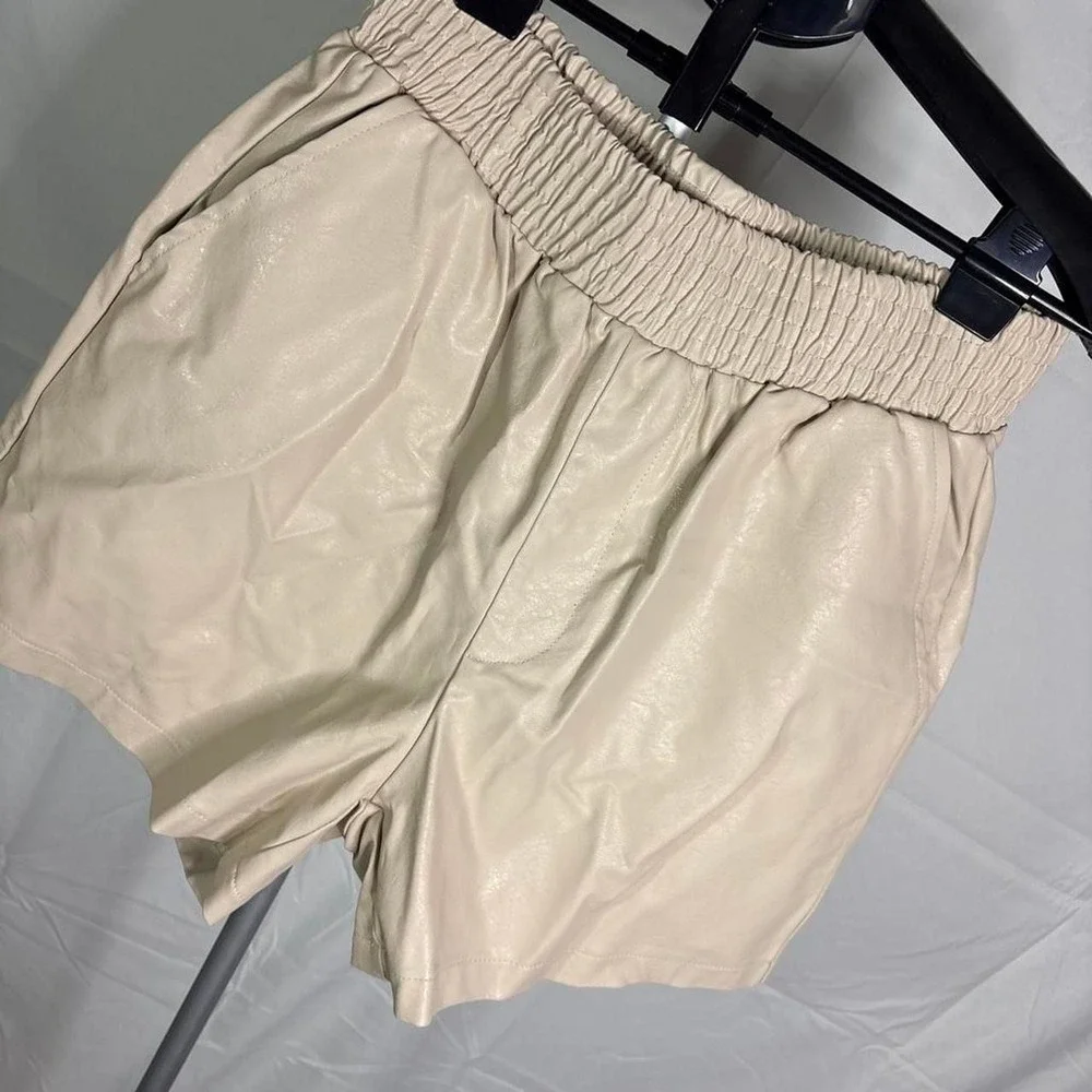 Princess Polly Cream Pleather shorts